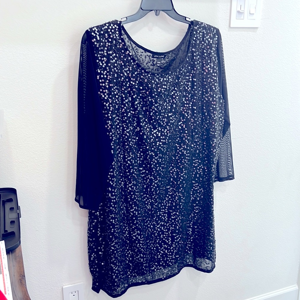 Black sequined tunic or short dress with sheer black sleeves